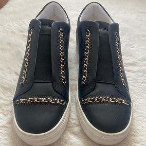 Black slip on sneakers